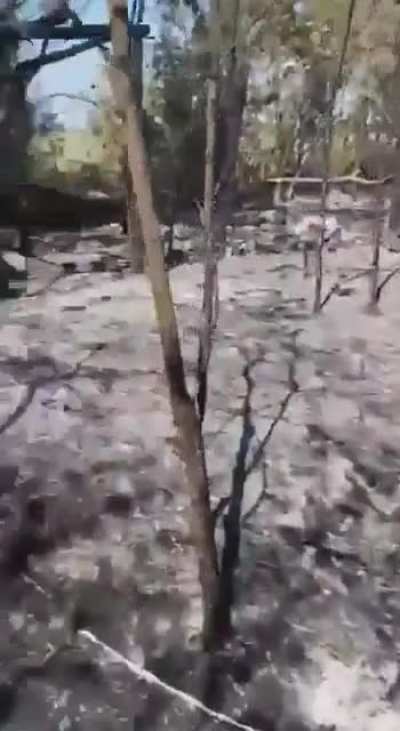 Footage of a Russian military showing the aftermath of a Ukrainian thermite drone working on their positions