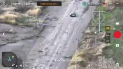 Ukrainian drones attempt to eliminate Russian delivery robot. Drone attacks at 0:30 and at 1:12.(Supposedly near Adviika. 2023)