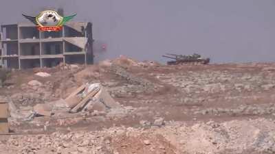 Liwa al-Tawhid ATGM team engages an SAA T-72 conspicuosly parked on Shuwaihna Hill, Aleppo - 6/10/2013