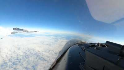 A Russian Su-35S nearly collides with an American F-16 during a routine intercept of a Russian Tu-95 bomber off the coast of Alaska, POV from the F-16 cockpit [23.09.2024]