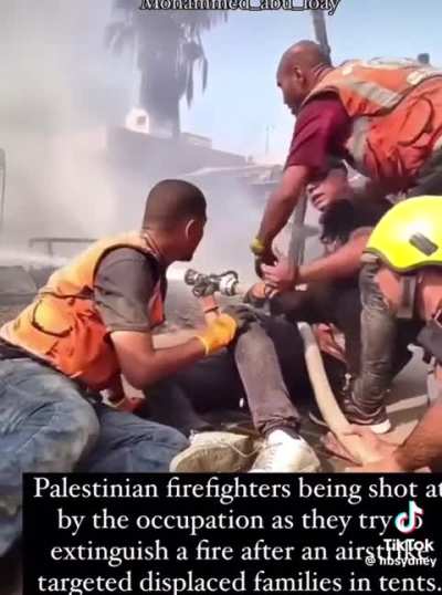 Palestinian firefighters being shot at by the IDF while they trying to put down tent fires after Israeli airstrikes.