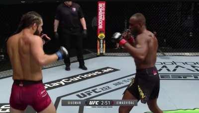 Masvidal throws a straight right that connects with the top of Usmans head (Ouch), then immediately follows up with a knee, uppercut, body kick, right hook. Beautiful combo sequence