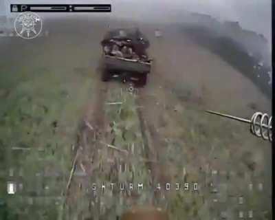 A Chinese DesertCross 1000-3 transferring Russian soldiers to the frontline is getting attacked by a Ukrainian FPV quad. A Russian soldier throws his assault rifle at the drone trying to stop it.