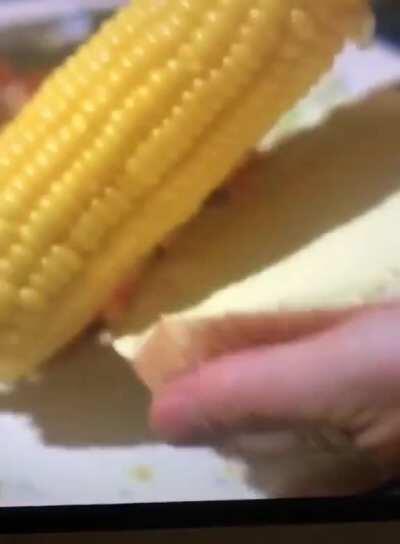 Easy and fast way to butter corn.