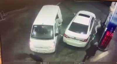 WCGW when trying to rob someone who is loading his car with gasoline