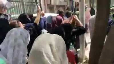 Taliban trying to calm down a crowd chanting 