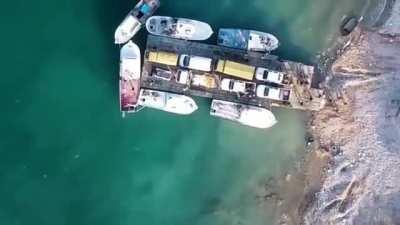 ISIS drones drop grenades on an SDF barge crossing the Euphrates near Raqqa (June 2017)