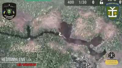 A Russian soldier tried to fight a Ukrainian FPV drone with a shovel