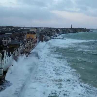 Heavy seas battering houses along the coast in Ste. Malo, France