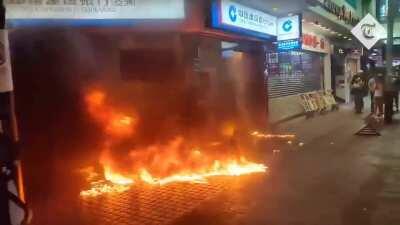 Hong Kong protesters firebomb a bank