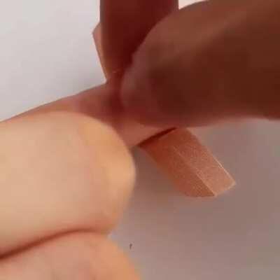 Super satisfying technique for finger bandages