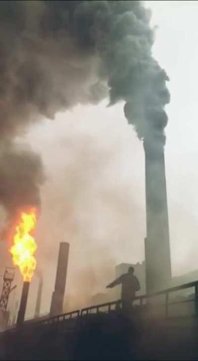 Lighting up a smoke stack with a torch