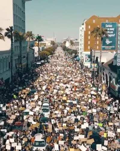 Drone footage over the LA Black Lives Matter protest on Hollywood Blvd today