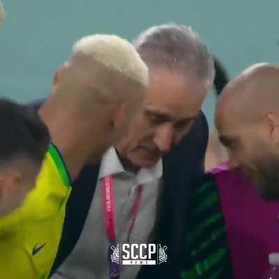 Brazil coach Tite doing the pigeon celebration with Richarlison