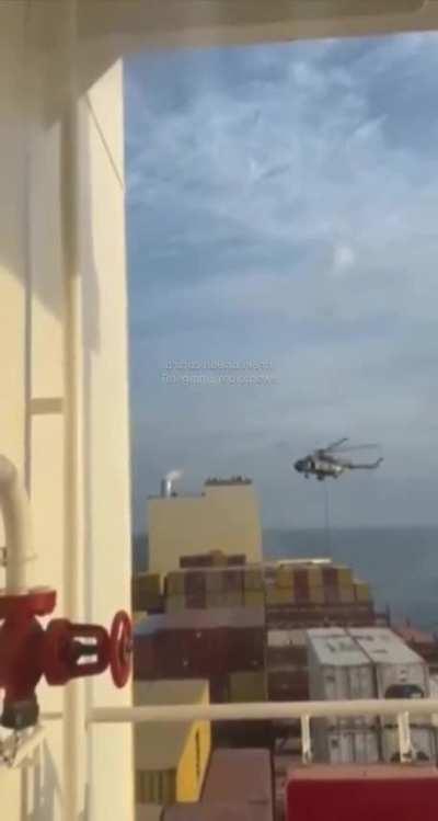 Iranian forces landing on the Portugese vessel 