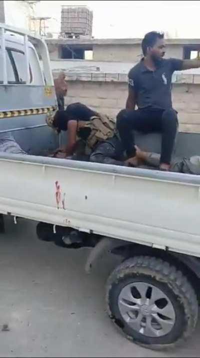 Syrian National Army (TFSA) members clashing with Turkish Forces evacuate their wounded using pickup trucks. Yesterday.