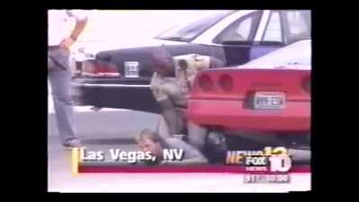 Las Vegas cop has a negligent discharge that almost hits a suspect and another cop!