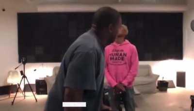 Ye showing Pharrell an early Ghost Town