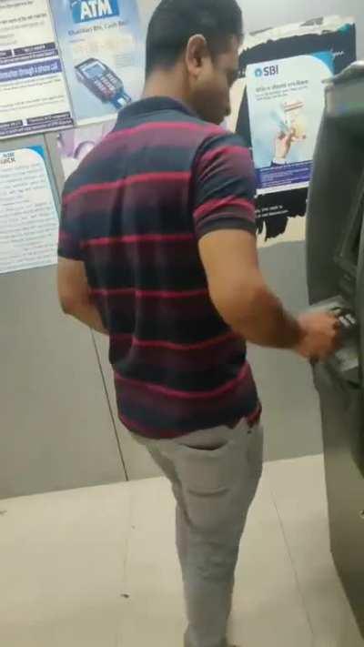 A man in India took his Phall*s out to seduce at an ATM only to shy and run-away when she turned on the camera and started scolding him