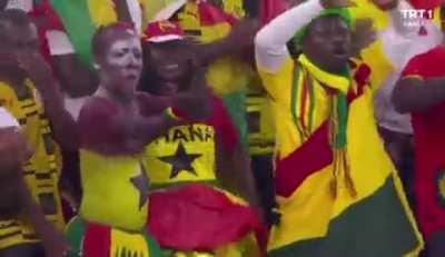 Ghanese fans while their team is drawing 2-2 against South Korea. Minutes after, Ghana scored a goal to lead 3-2