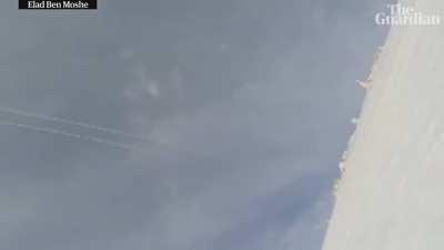 Missile interception caught on snowboarder's camera in Israel. You can see the Iron Dome system in action.