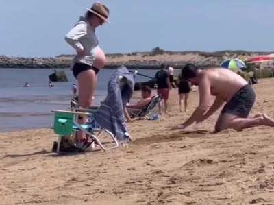 This guy dug a hole in the sand