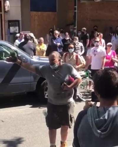 Protester gives an Impassioned Speech to the Gathered Crowd