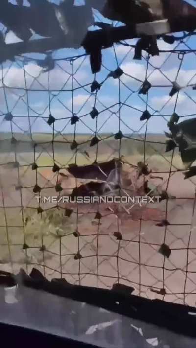 A Russian serviceman filmed the moment a Ukrainian FPV drone attacked his Bukhanka car with an electronic warfare system