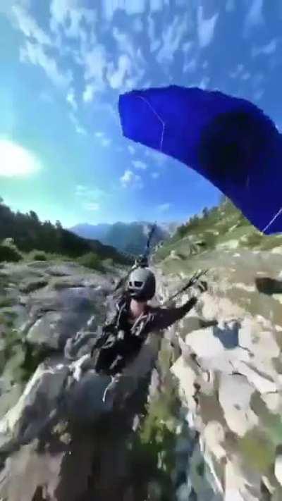 Insane paragliding skills.