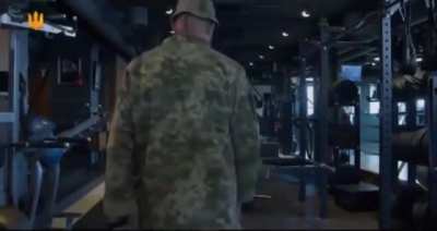 UA POV: A Ukrainian recruitment ad depicts men in a gym who pretend to be statues, crossdressers, or disabled when a military recruiter comes knocking.  But one brave soul volunteers for the AFU - the female receptionist. 