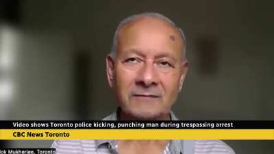 Toronto cops captured on video swarming, punching and kicking man during trespass arrest.