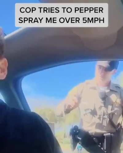 Cop pulls over a man going 5 over the speed limit, tries to stop citizen from filming him by macing him and threatening to use a taser. Confirms he is going to arrest the citizen for lawfully recording him. If anyone knows what department this is, let me 