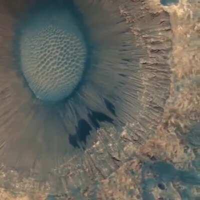 Gorgeous 1.5 km wide crater on Mars captured by the HiRISE camera aboard a NASA satellite orbiting the red planet