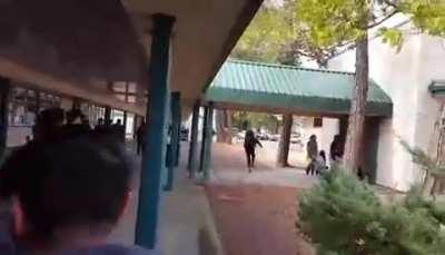 Female student beats up male student and then runs away from Teacher