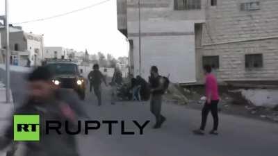 Israeli Soldier throw Disabled Palestinian off his wheel chair