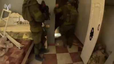 Israeli soldiers secure a house in Gaza (unknown date or location)