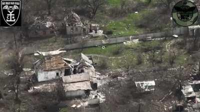 Russian soldiers trying to take shelter from Ukrainian mortar fire.