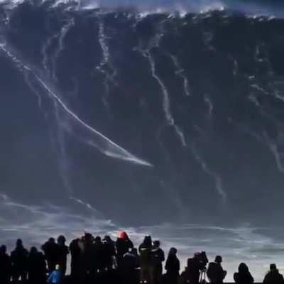 Sebastian Steudtner, a German pro surfer, rode a wave over 115 feet tall at Nazare, Portugal, a record breaking surf!