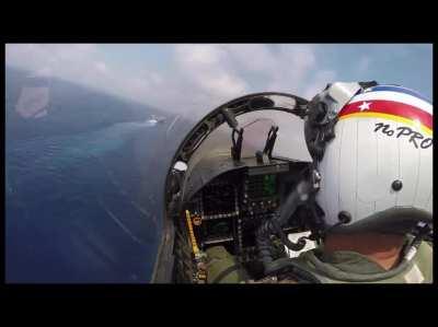 F/A-18F Super Hornet landing on aircraft carrier…