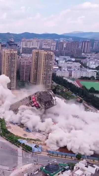 China demolishes 15 buildings in 45 seconds because they couldn’t secure funding to finish the project