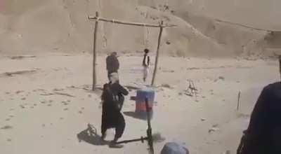 [NSFW/DEATH] Taliban hang, then open fire on two men (location/date unknown)