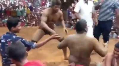 That's called Kusti/Dangal in India, this is indian wrestling.