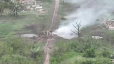 Russian's try to jump tank over destroyed bridge.