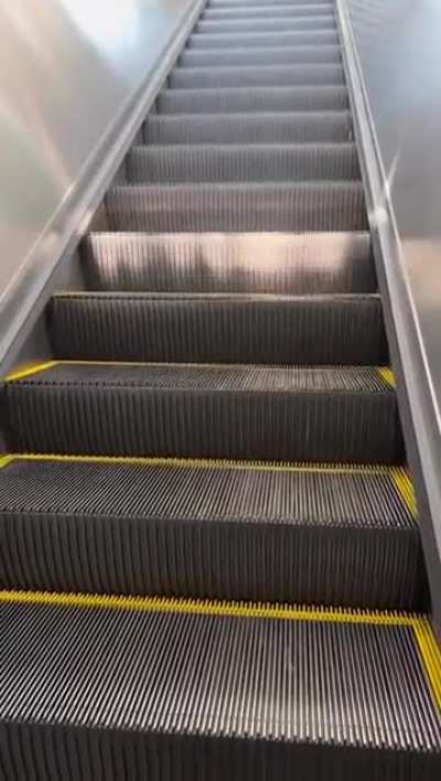 Sunlight falling down the escalator