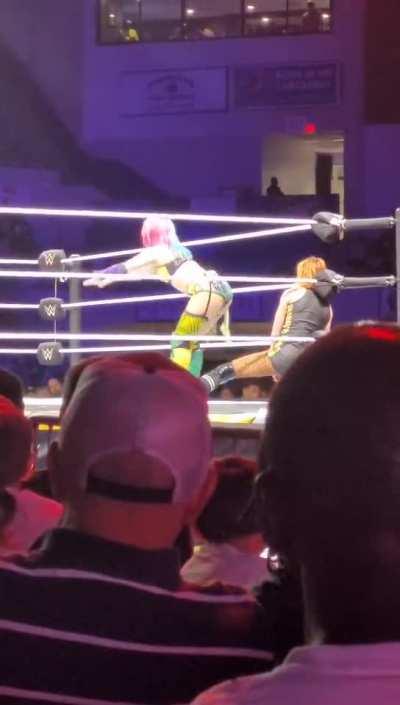 Asuka delivering a really long and intense stinkface to Becky Lynch!