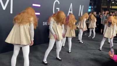 A group of M3GANs dance to Taylor Swift at TCL Chinese Theatre.