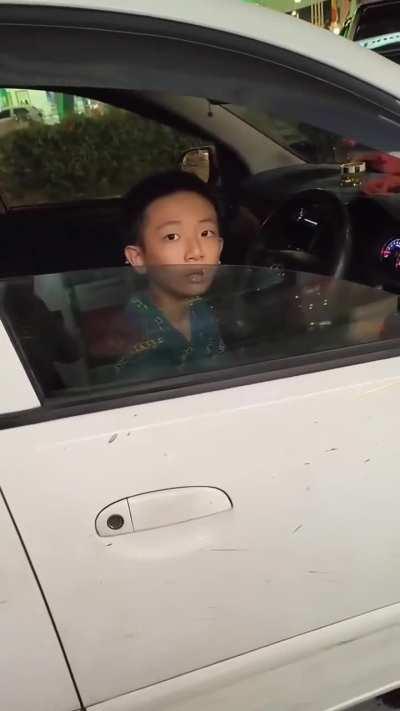 Underage child driving in the road