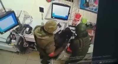 Video of Russian spetsnaz looting a Ukrainian supermarket.