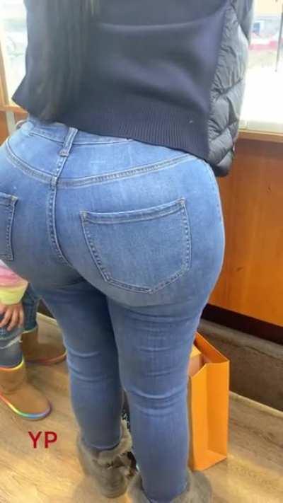 It takes strong denim jeans to contain this big ass