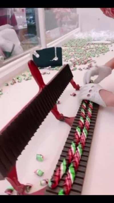 Candy being cut into pieces.